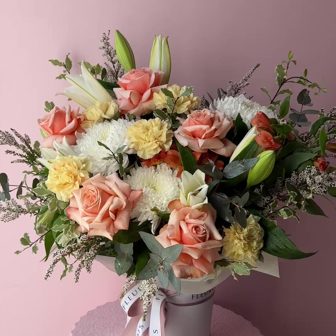 Video showing the Apricot Floral Box arrangement from different angles.